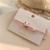 Maneki-Neko-Bracelet-in-ULtress-e-red-handmade-for-women-bell-jewelry-UL.jpg_640x640.jpg_ Bracelet Japonais Maneki Neko - Rose