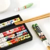 Sb694f022c79e4b3586a9fe071ebfa0138 (1) (1) Baguettes Japonaises Daruma et Maneki Neko